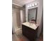 Bathroom with a sleek vanity, neutral walls, and a glass-enclosed shower at 130 Oak Tree Dr, Debary, FL 32713