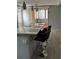 Kitchen island with seating and stone countertops at 130 Oak Tree Dr, Debary, FL 32713