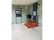 A cozy patio with a cute step-up to a door and a 'Live Well Laugh Often Love Much' sign at 130 Oak Tree Dr, Debary, FL 32713