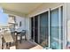 Inviting balcony with comfortable seating, perfect for relaxing and enjoying the views at 100 Silver Beach Ave # 716, Daytona Beach, FL 32118