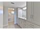 Spacious bathroom with a shower, offering plenty of storage with a clean design, and bright lighting at 100 Silver Beach Ave # 716, Daytona Beach, FL 32118