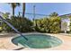 Relaxing hot tub surrounded by lush greenery, offering a private spa experience at 100 Silver Beach Ave # 716, Daytona Beach, FL 32118