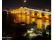 Night view of the Halifax River and Daytona Beach bridge lit up at night at 100 Silver Beach Ave # 716, Daytona Beach, FL 32118