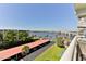 Expansive view from the balcony overlooking the water, with covered parking visible at 100 Silver Beach Ave # 716, Daytona Beach, FL 32118