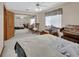 Bright bedroom featuring a large closet with mirrored doors and a plush bed at 1033 Pearl Tree Rd, Deltona, FL 32725