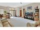 Cozy living area featuring neutral walls, a large front door, and access to other rooms at 1033 Pearl Tree Rd, Deltona, FL 32725