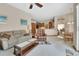 Open-concept living room offering views of the kitchen and dining area, creating a spacious feel at 1033 Pearl Tree Rd, Deltona, FL 32725