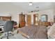 Bedroom featuring neutral walls, vaulted ceiling, and wood furniture at 1033 Pearl Tree Rd, Deltona, FL 32725