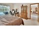 Bedroom with work space and a view of the pool at 1033 Pearl Tree Rd, Deltona, FL 32725