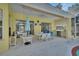 Outdoor patio featuring a dining area and outdoor kitchen space for entertaining at 1033 Pearl Tree Rd, Deltona, FL 32725