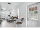 View of the living room and kitchen showcases the open floor plan at 104 Hester Ave, New Smyrna Beach, FL 32168