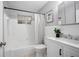 Well-lit bathroom with a combined shower and tub, a vanity, and modern fixtures, offering comfort and functionality at 1044 Deltona Blvd, Deltona, FL 32725