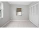 Simple bedroom with closet and neutral decor provides a calm and adaptable space for relaxation at 1044 Deltona Blvd, Deltona, FL 32725