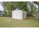 Exterior view of a backyard shed, providing additional storage space and functionality for outdoor equipment at 1044 Deltona Blvd, Deltona, FL 32725