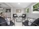 Inviting sitting room with modern decor and a view of the dining and living spaces at 1044 Deltona Blvd, Deltona, FL 32725