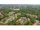 An aerial view of a community surrounded by trees and lush landscaping at 110 Cypress Woods Ct # 2B, Deltona, FL 32725