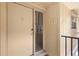 The front door is beige with glass door at 110 Cypress Woods Ct # 2B, Deltona, FL 32725
