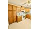 Traditional kitchen with light wood cabinets, countertops, and a full set of appliances at 111 S Delaware Ave, Deland, FL 32720