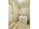 Bright laundry area features a white washer and dryer at 111 S Delaware Ave, Deland, FL 32720