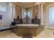 Bathroom boasts a modern soaking tub and glass enclosed shower at 1117 Oxbridge Ln, Ormond Beach, FL 32174