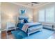 Charming bedroom with blue accents and a comfortable bed at 1117 Oxbridge Ln, Ormond Beach, FL 32174