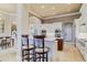 Bright, gourmet kitchen featuring stainless steel appliances and a breakfast bar at 1117 Oxbridge Ln, Ormond Beach, FL 32174