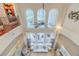 Open living room with soaring ceilings and backyard view at 1117 Oxbridge Ln, Ormond Beach, FL 32174