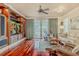 Cozy living room with hardwood floors and built-in entertainment center at 1117 Oxbridge Ln, Ormond Beach, FL 32174