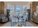 Inviting living room with stylish furniture, large windows, and elegant decor at 1117 Oxbridge Ln, Ormond Beach, FL 32174