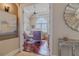 Bright office featuring a ceiling fan, arched window, and ample natural light at 1117 Oxbridge Ln, Ormond Beach, FL 32174