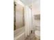 Bathroom featuring a shower with glass door, toilet and neutral colors at 115 San Marino Ln, Deland, FL 32724