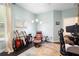 Bright office features natural lighting, hard floors and relaxing furniture at 115 San Marino Ln, Deland, FL 32724