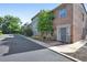 Attractive brick townhome featuring manicured landscaping and a private entryway at 117 N Garfield Ave # 16, Deland, FL 32724