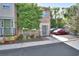 Charming brick townhome with well-maintained landscaping and dedicated parking spaces at 117 N Garfield Ave # 16, Deland, FL 32724