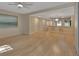 Open living area with light hardwood floors, recessed lighting, and bar seating at 117 N Garfield Ave # 16, Deland, FL 32724