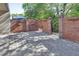 Private brick-walled patio offers a secluded outdoor space, perfect for relaxation and quiet enjoyment of the surrounding scenery at 117 N Garfield Ave # 16, Deland, FL 32724