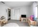 Well-lit bedroom with neutral colors and ample storage, perfect for a room at 1369 Saxon Blvd, Deltona, FL 32725