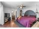 Serene main bedroom with a ceiling fan, and an ensuite bathroom for added privacy and comfort at 1369 Saxon Blvd, Deltona, FL 32725