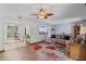 Bright living room flows into the kitchen, offering a seamless and inviting living space at 140 Orchid Woods Ct # 14B, Deltona, FL 32725