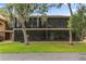 This condo complex features screened porches, perfect for outdoor relaxation and enjoying the serene surroundings at 140 Orchid Woods Ct # 14B, Deltona, FL 32725
