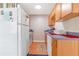 Functional kitchen with modern appliances, wooden cabinets, and ample counter space at 1479 Renton St, Deltona, FL 32725
