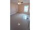 Bedroom featuring tile floors, and a ceiling fan at 1491 E Palomar Dr, Deltona, FL 32738