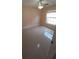 Bedroom featuring tile floors, and a ceiling fan at 1491 E Palomar Dr, Deltona, FL 32738