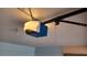 Garage door opener attached to the ceiling at 1491 E Palomar Dr, Deltona, FL 32738
