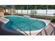 Wide view of screened-in pool and outdoor space with privacy fence at 1491 E Palomar Dr, Deltona, FL 32738