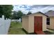 A backyard shed with a ramp offers extra storage space at 1491 E Palomar Dr, Deltona, FL 32738