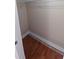 Walk-in closet featuring wood floors and wire shelving at 1491 E Palomar Dr, Deltona, FL 32738