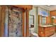 Bathroom featuring double sinks, granite countertops, and a unique stone shower at 160 Rose Ave, Lake Helen, FL 32744