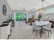 Open-concept living space with access to the outdoors, stylish furnishings, and modern decor at 173 Old Moss Cir, Deland, FL 32724