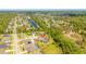 Picturesque neighborhood nestled among lush greenery with backyard pools and serene surroundings at 1855 Cattle Creek Ln, Port Orange, FL 32128